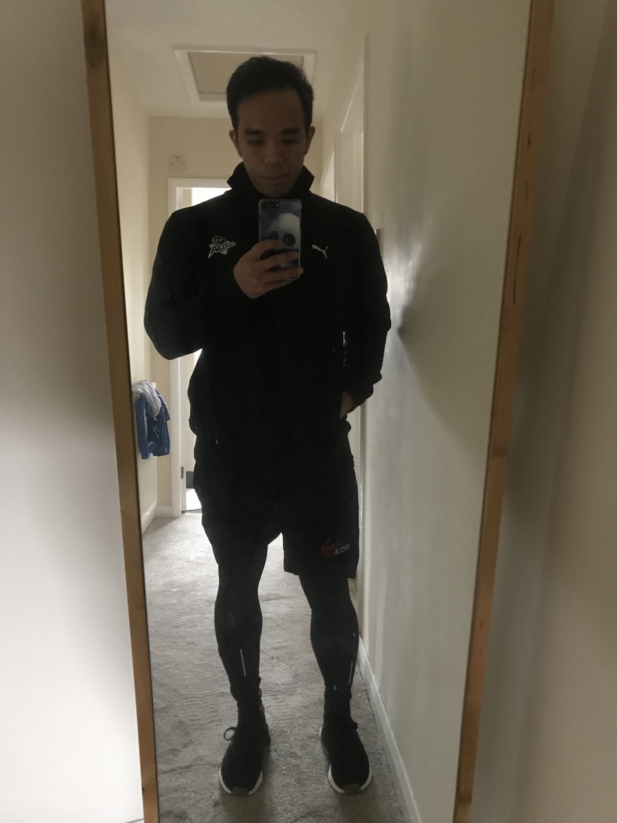 Jenkin Lee wearing his Virgin Active fitness coach uniform in 2018